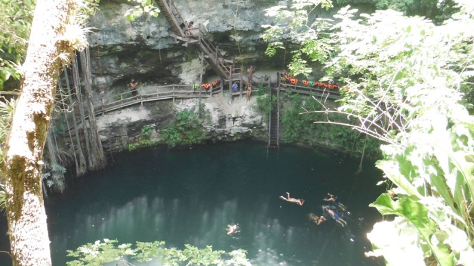Xcanche cenote swimmers from above